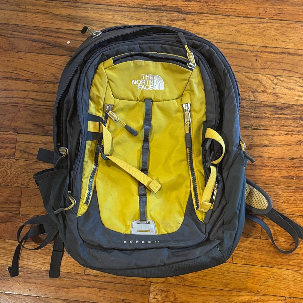 The North Face surge II Backpack in Yellow and Black